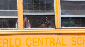 Haitian mom and child on a bus