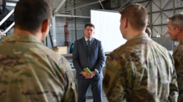 Airmen from US Air Force Special Operations Command brief Christopher Maier, assistant secretary of defense for special operations and low-intensity conflict.