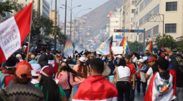 Protesters march in Lima