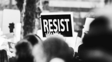 Protest sign saying "resist"