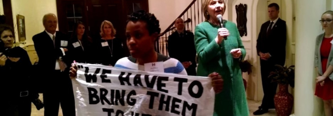 Protest in front of Hilary Clinton