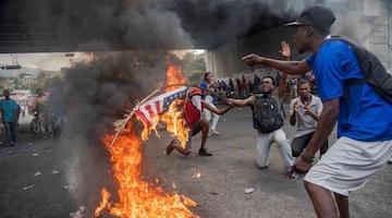 Shooting at Haitian Parliament Surprises Few as Anti-Government Protests Continue